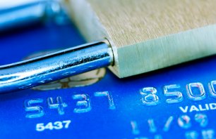 Lock and credit card - safe business concept